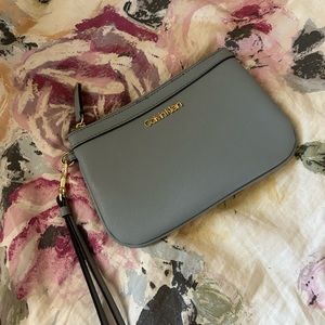 Blue Calvin Klein wristlet